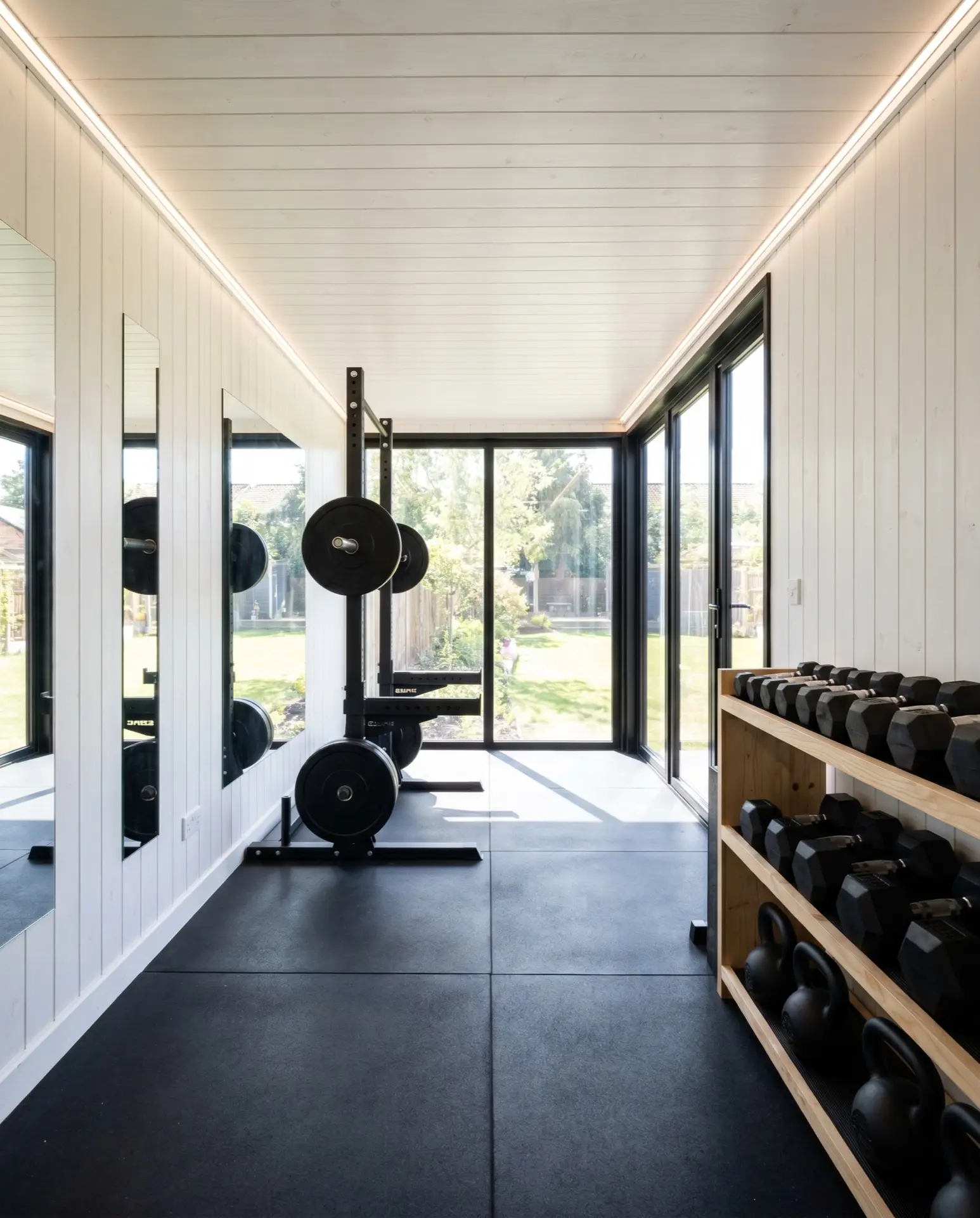 20ft Home Gym: rubber floor & mirror wall